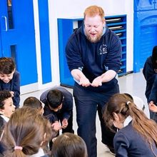 Musical activities. Kids looking happy at Music teacher