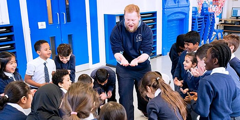 Musical activities. Kids looking happy at Music teacher